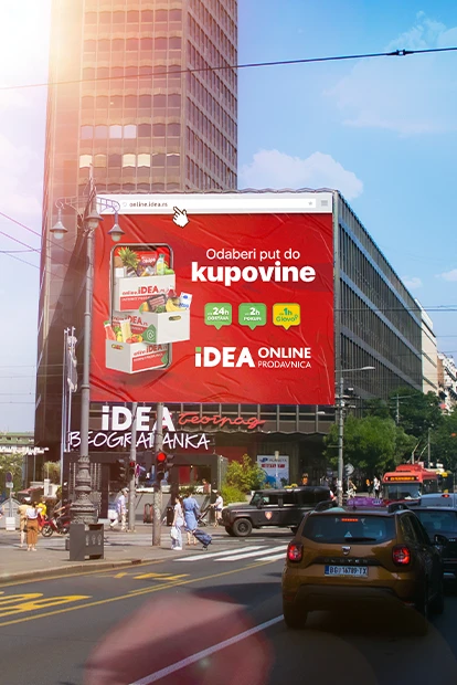 Dnevna fotografija palate Beograđanka sa bilbordom na kojem je reklama Odaberi put do kupovine za IDEA online prodavnicu