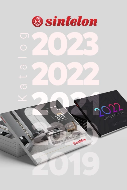 Odštampani katalozi tepiha na sivoj pozadini sa označenim godinama od 2019. do 2023.