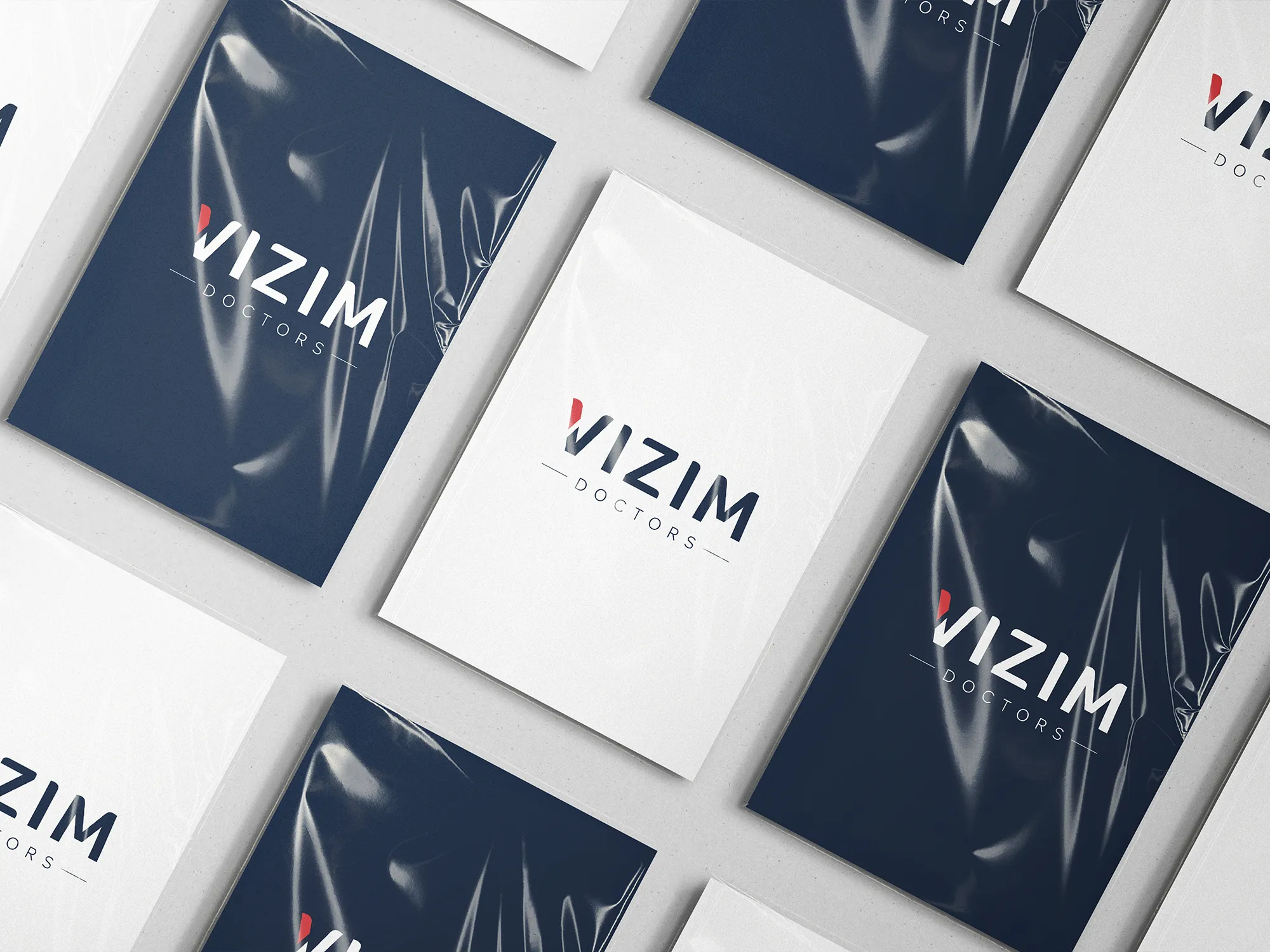 Prikaz novog logotipa Vizim doctors na različitim pozadinama